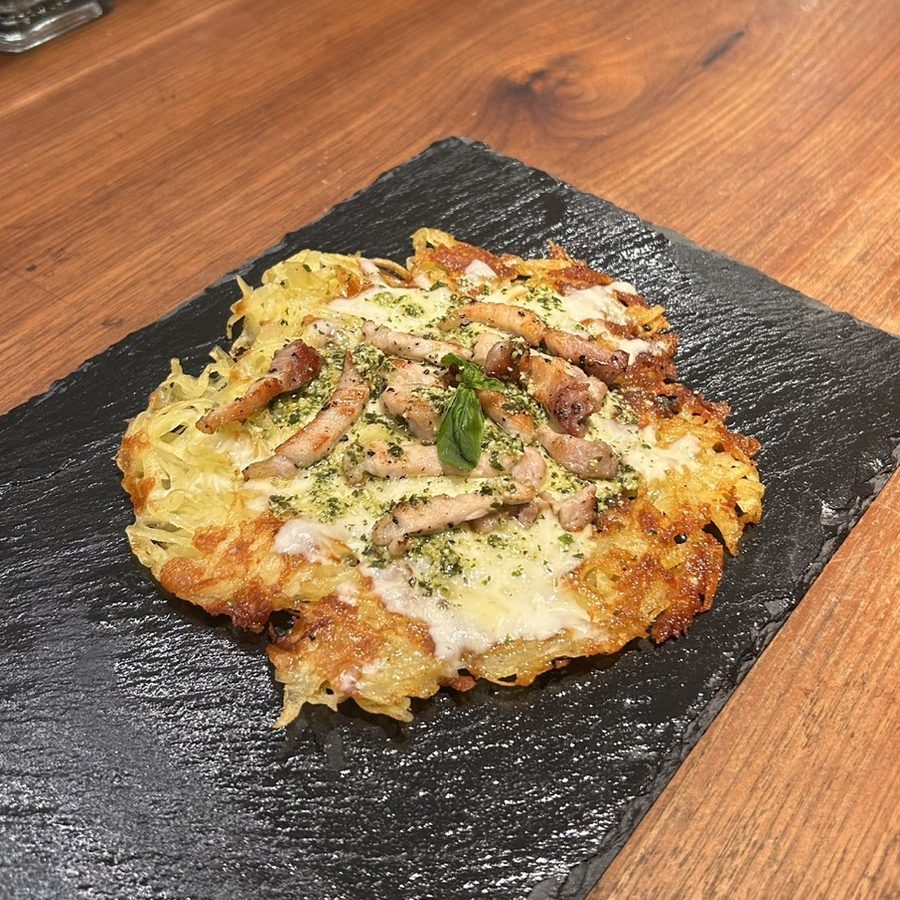 Potato galette with pork and melted cheese